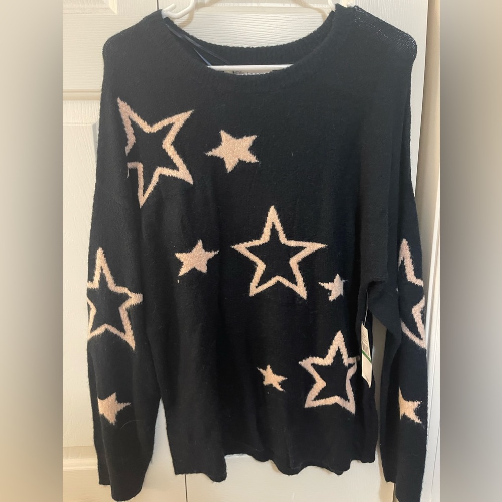 Navy sweater with pink stars size L